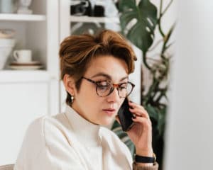 woman getting help with webinar issues
