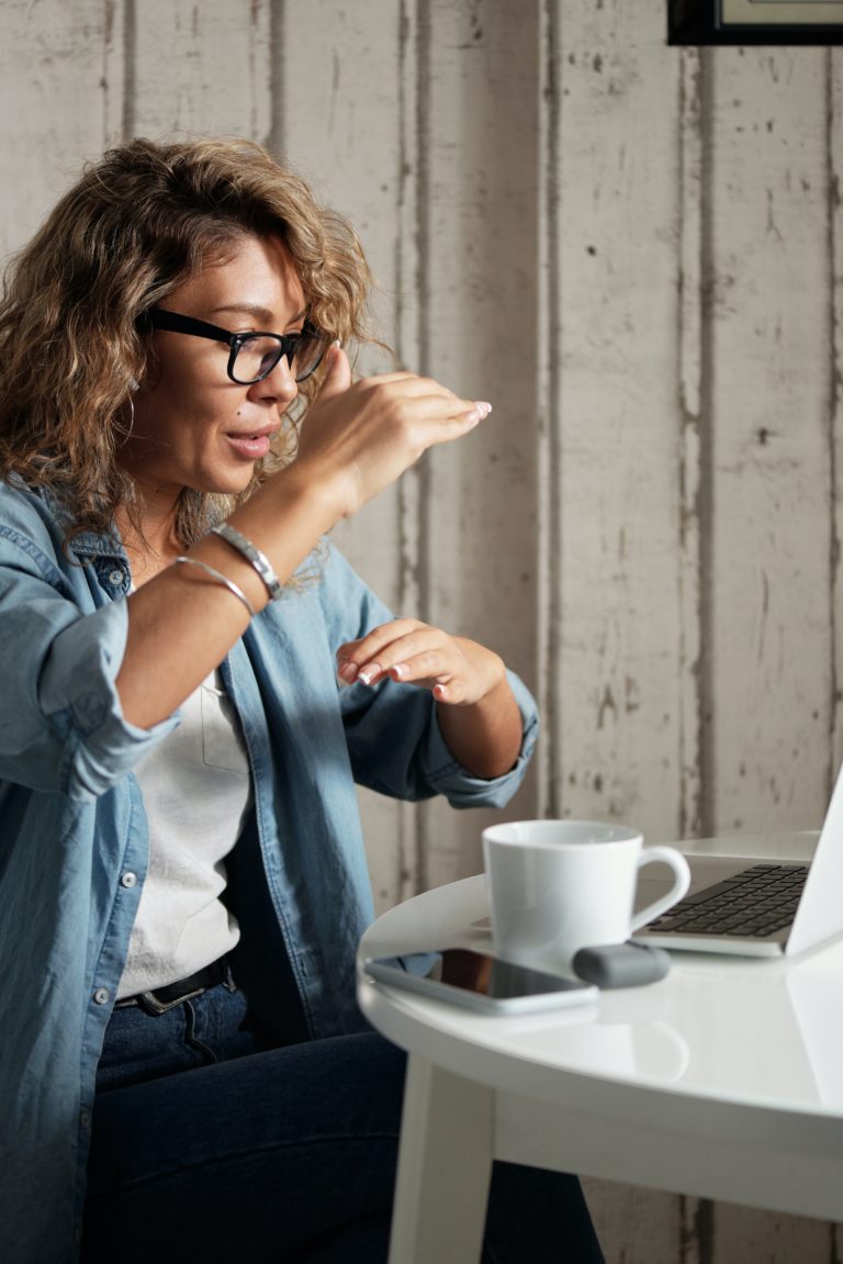 woman explaining benefits of prerecorded webinar platforms